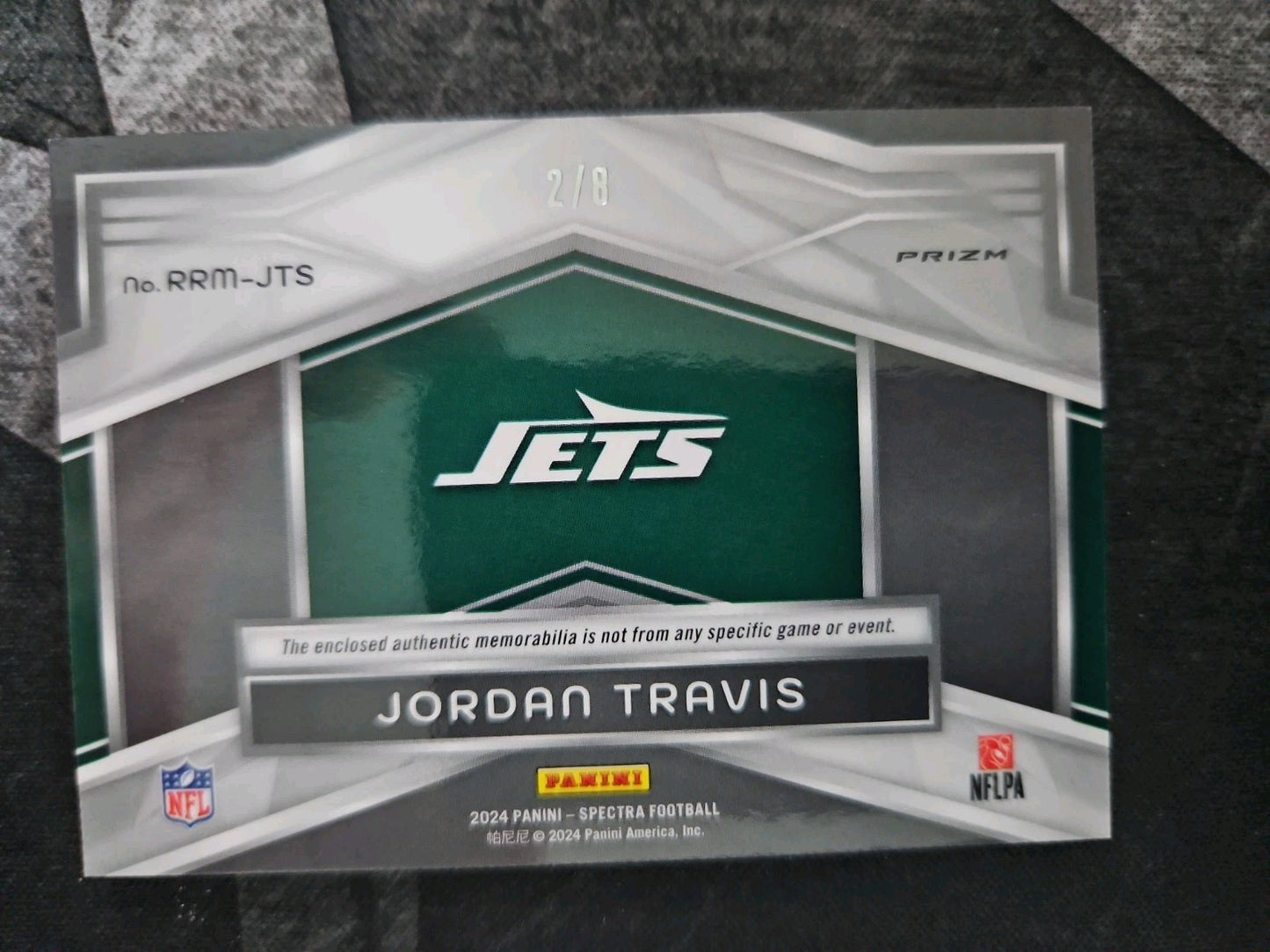 2024 Panini Spectra - Rising Rookie Jordan Travis #RRM-JTS Splatter Neon /8