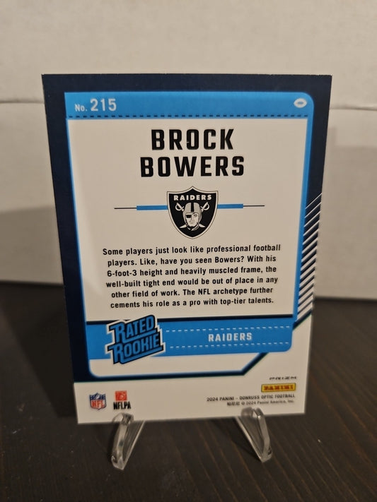 2024 Panini Donruss Optic - Rated Rookie Brock Bowers #215 Blue Scope Prizm (RC)