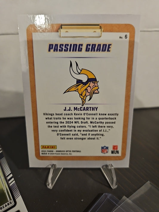 2024 Donruss Optic JJ McCarthy Passing Grade No. 6 Minnesotta Vikings